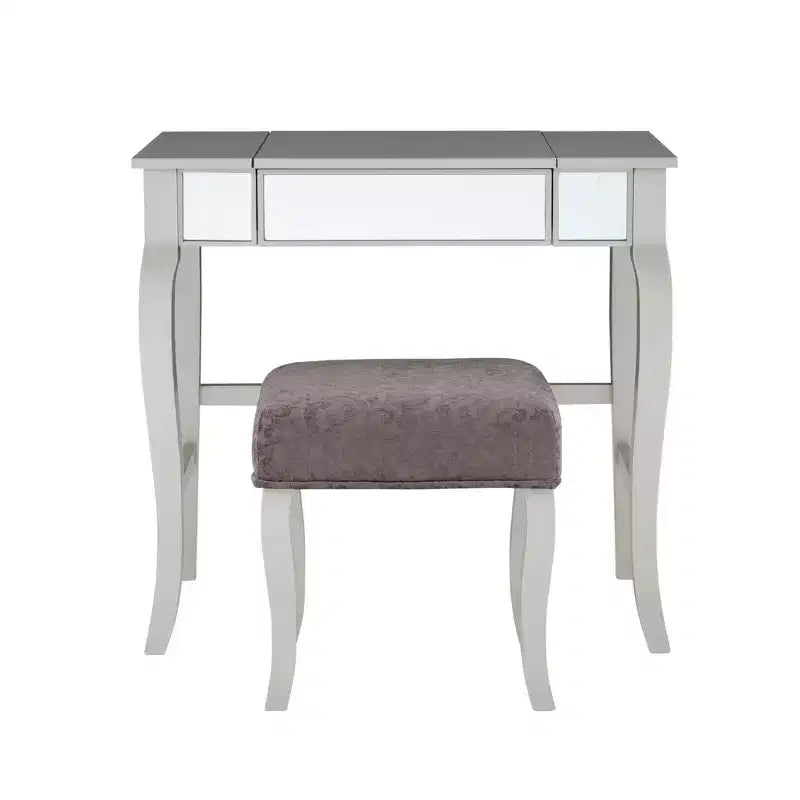 Tocador con espejo plateado abatible y taburete gris, 1 persona