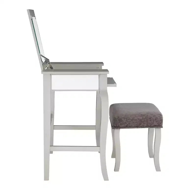 Tocador con espejo plateado abatible y taburete gris, 1 persona